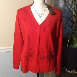 Woman's NWT  Victoria Collection red cardigan m/lg. V neck  With blk. Rose print
